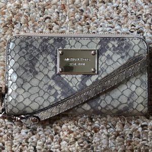 The best wallet/wristlet ever. Grey snakeskin!